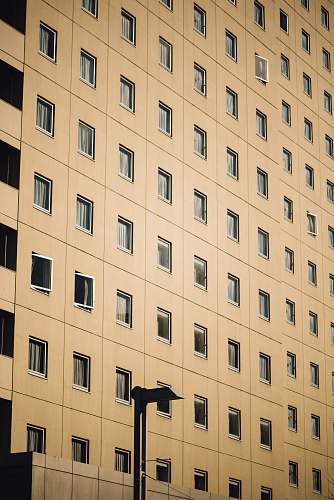 iphone wallpapers beige concrete high rise building facade iphone backgrounds